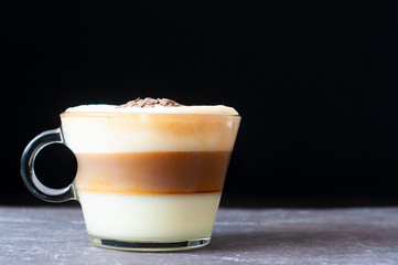 Freshly made Cuban Coffee with layers of condensed milk, fresh espresso coffee and foamed milk.