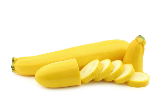 Yellow Zucchini And A Cut One  On A White Background