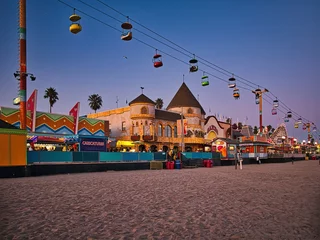 Wall murals Descent to the beach Beach boardwalk with an amusement park taken in Santa Cruz, CA