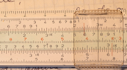 Cole up 1970s old Italian-made pocket slide rule mechanical calculator.