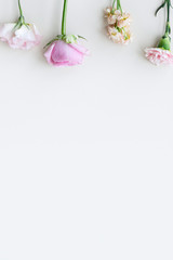 Flowers arranged in a white background
