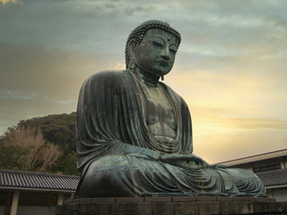 The "Great Buddha" (Daibutsu) bronze statue at the Kotoku-in Buddhist temple in the city of Kamakura in Kanagawa Prefecture, Japan - the statue has been designated "National Treasure" status.