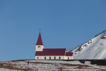 Beautiful Red Church on a Mountain Top at Vik, Iceland.