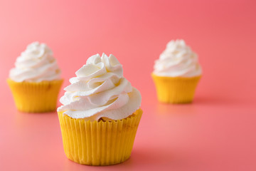 Homemade Birthday cupcake on pink Background.