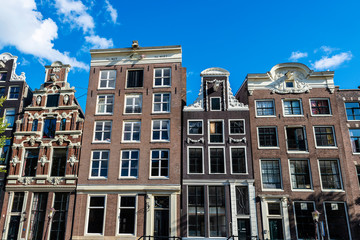 Old traditional leaning houses in Amsterdam, Netherlands