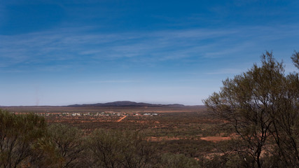 Fototapeta na wymiar Aboriginal comunity of Yuendumu. In the Tanami Desert in Australia. With two litlle tornado.