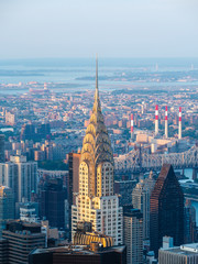 Architectural landmark Chrysler Building, an Art Deco–style skyscraper located in Manhattan, New York City, United States of America. - obrazy, fototapety, plakaty