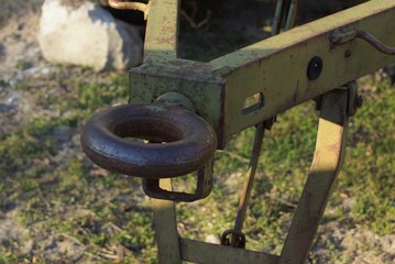 one old iron brown iron hitch on the street