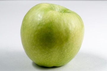 Green apple on white background
