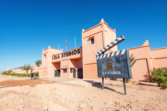 Main gate and advertising clipperboard of CLA Studios in Morocco