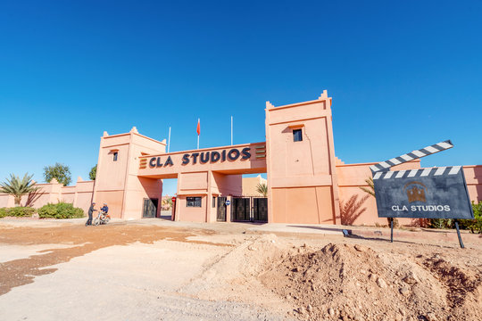 Main gate and advertising clipperboard of CLA Studios in Morocco