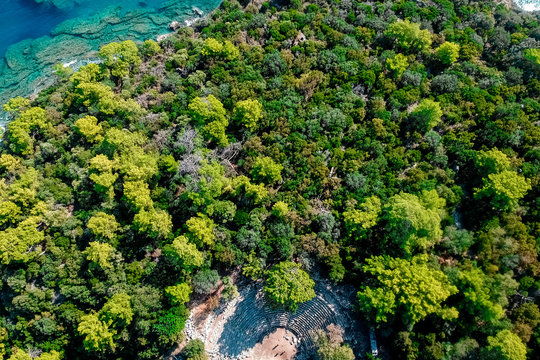 Top view of the ruins of an amphitheater near the old town of Fazelis. Beautiful park on the Mediterranean coast. Top view of the reserve. tourist attraction and top places in Turkey.