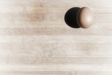 Isolated Egg on a Wood Table