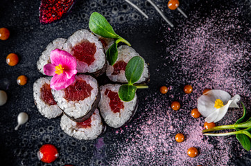 sushi roll with tuna and rice in plate