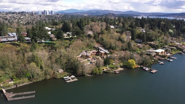 Aerial / drone footage of waterfront mansions, luxury homes and villas in Medina near Belleview and Seattle, Washington during the COVID-19 pandemic