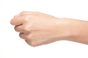 moist wet fist holding hand.
