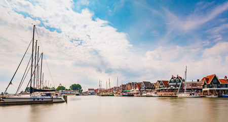 Volendam traditional Dutch fishing village, view at the harbour,