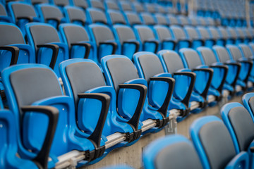 Fototapeta premium Empty blue seats in stadium