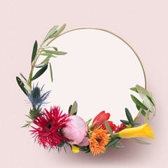 Obraz na płótnie Canvas Flowers in a circle frame