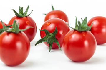 Composition of Ripe Cherry Tomatoes on White Background