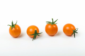 Orange Cherry Tomatoes Isolated on White Background