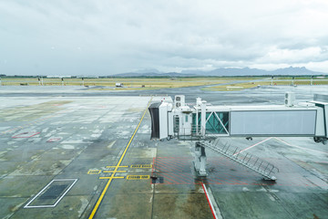 boarding air bridge, jet bridge on an airport tarmac in Cape Town, South Africa