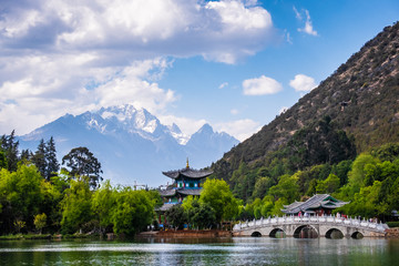 Naklejka premium the black dragon pool in front of Jade dragon Snow Mountain the most beautiful snow mountain in Lijiang, Yunnan, China