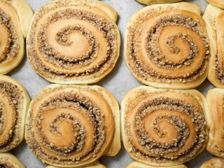 Sweet homemade cinnamon buns. Sweet cinnamon rolls. Top view