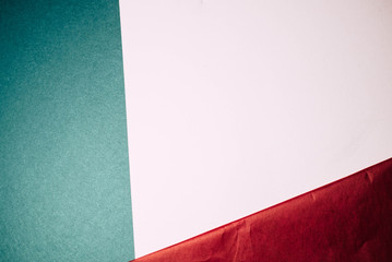 Three pieces of multicolored paper