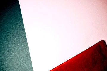 Three pieces of multicolored paper