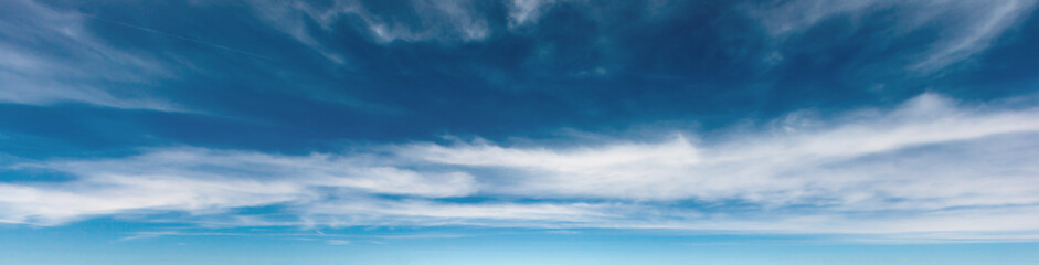 Blue sky background with clouds