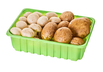 Champignon mushrooms in packing isolated