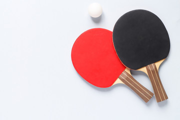 sports composition. Ping pong close-up. rackets for playing on a blue background