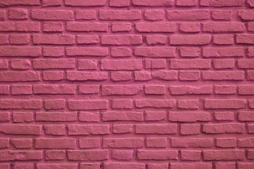Front View of Magenta Colored Old Brick Wall for Background or Banner	
