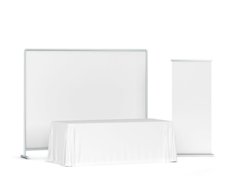 Blank tradeshow tablecloth with roll-up banners aside