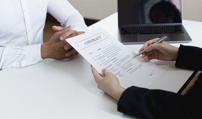 Employer or HR department is reading the resume and interviewing the ability of new employees, Employer is selecting job applicants, Employment and Recruitment Concept.