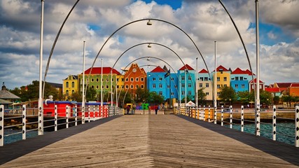 The Queen Emma Bridge, a pontoon bridge across the St. Anna Bay