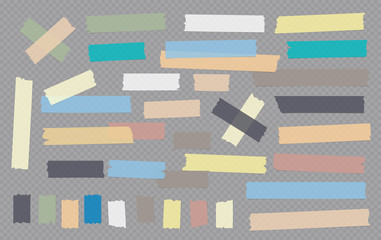 Colorful different size adhesive, sticky, masking, duct tape, paper pieces are on grey squared background