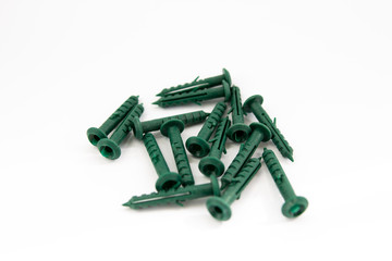 green dowels on a white background