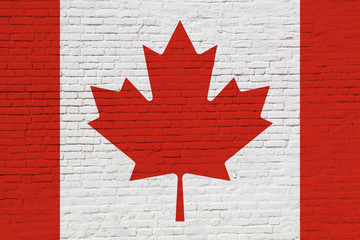 National Canada flag painted on brick wall