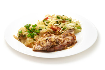 Pork steak with mashed potatoes, isolated on white background