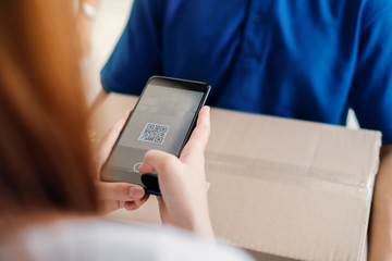QR Code Scaning door to door delivery express sending send a package to customer receiver sign with...