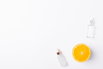 Cosmetic serum bottles with vitamin C