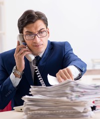 Busy man complaining about his workload