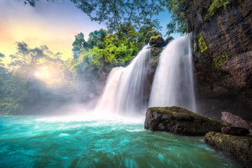 Fototapeta premium Waterfall in tropical forest at Khao Yai National Park, Thailand. View of the waterfall from below.