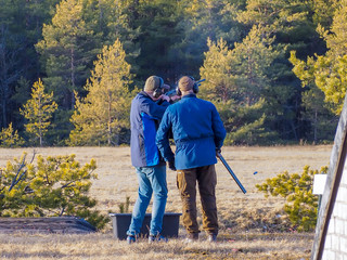 Men shooting outdoor