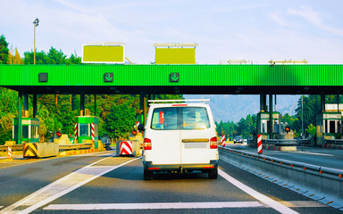 Plakat Cars at Toll booth with Blank signs in road Slovenia reflex
