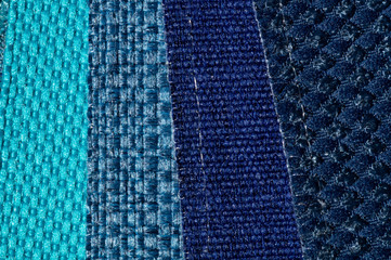 Catalog of fabric in blue turquoise shades. Fabric sample. Industry background. 