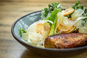 Roman lettuce salad with grilled chicken breast