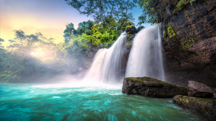 Fototapeta premium Waterfall in tropical forest at Khao Yai National Park, Thailand. View of the waterfall from below. 16:9 Ratio.
